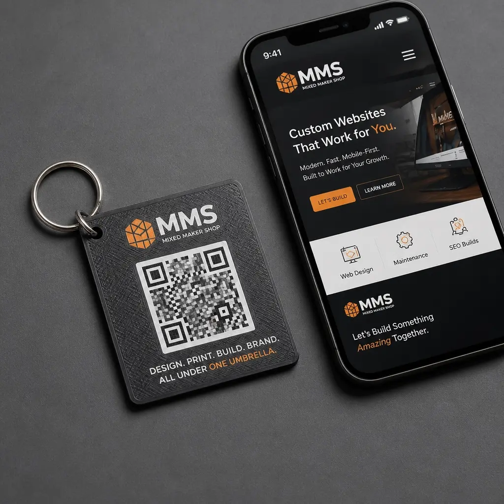Close-up of a 3D printed keychain with an embedded QR code